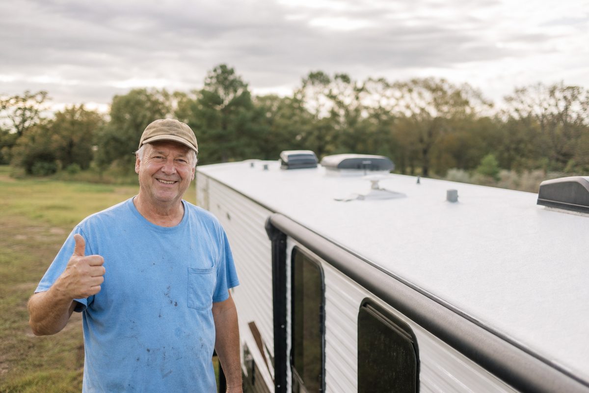 Happy customer with a freshly coated roof