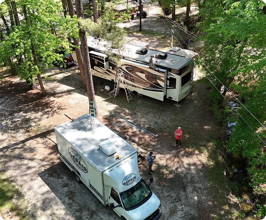 Technician inspecting an RV roof