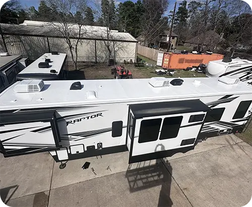 Technician inspecting an RV roof