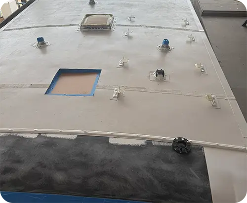 Technician inspecting an RV roof