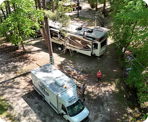 Technician inspecting an RV roof